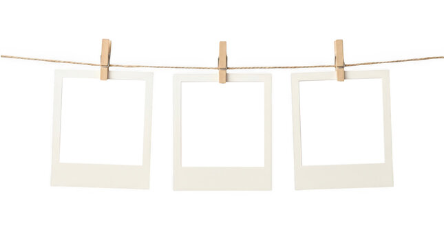 Polaroid frames on string isolated on transparent background