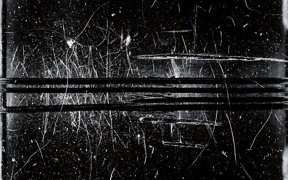 Old scratched film negative texture overlay with heavy dust particles and harsh scratches for vintage design effects
