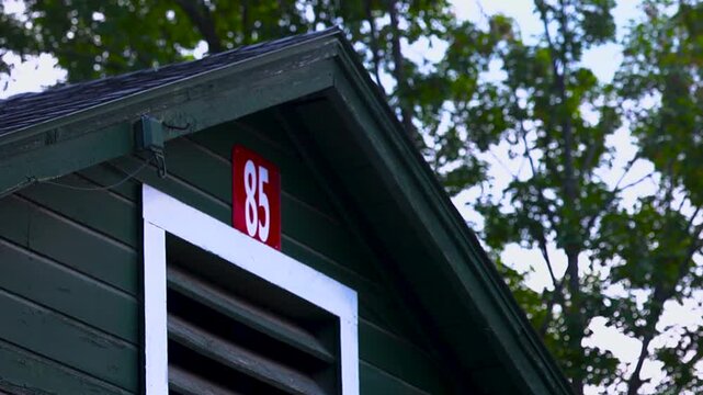 Close up of barn 85 on a thoroughbred race track