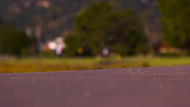 close up of cyclist riding in the park