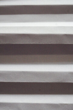 Close-up view of textured white corrugated material
