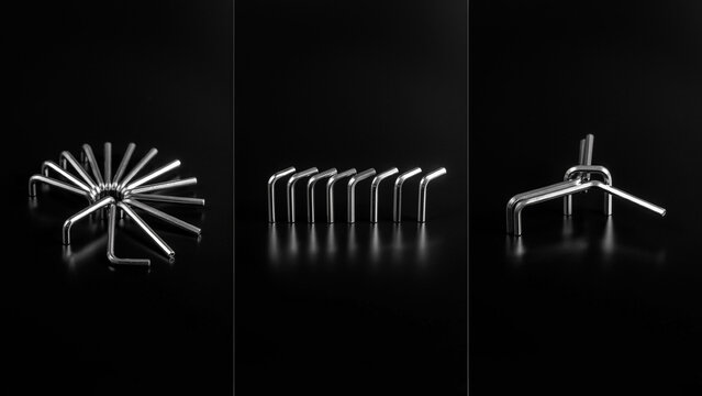Metallic l-shaped hex keys arranged in geometric patterns on a dark reflective surface