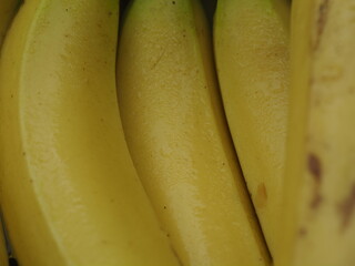 close up of bananas macro view of ripe yellow bananas in a fresh bunch © nitesh