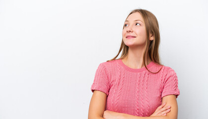 Fototapeta premium Young Russian woman isolated on white background looking up while smiling