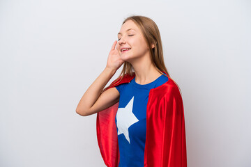 Super Hero Russian woman isolated on white background listening to something by putting hand on the ear © luismolinero