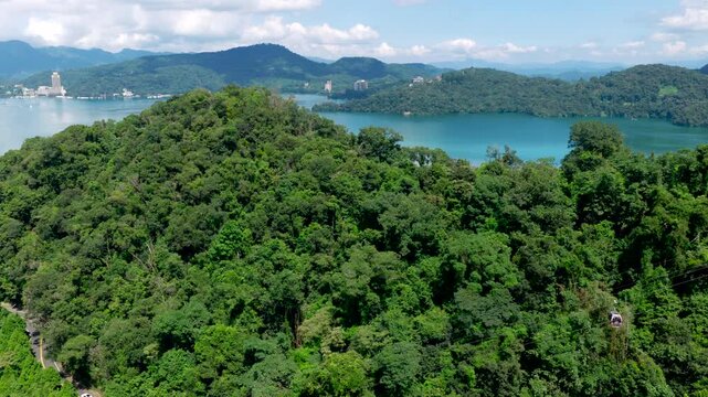 An aerial view of the Sun Moon Lake cable car and lake scenery.