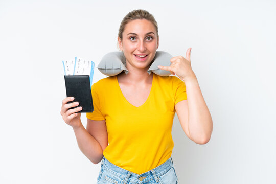 Woman with Inflatable Travel Pillow making phone gesture. Call me back sign