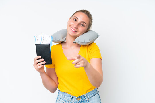 Woman with Inflatable Travel Pillow pointing front with happy expression
