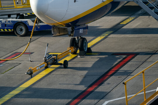 Aircraft Towbar Connected to Nose Landing Gear at Dublin Airport