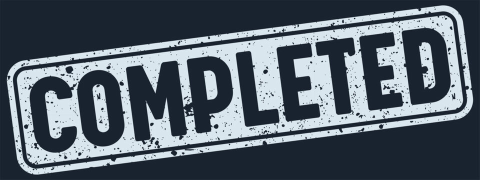 completed stamp. completed white rectangular grunge stamp on dark blue background
