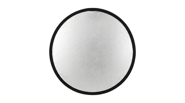 A professional circular photography light reflector with a silver surface for bouncing light, essential equipment for studio portraits and professional videography setups.