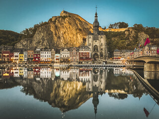 Dinant, 19.09.2026, Belgium, A beautiful view of the promenade and the Notre-Dame Collegiate Church. The City of Saxophones and the gateway to the Ardennes  © Bartomiej