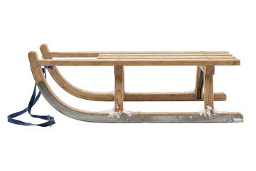 Obraz premium Classic wooden sled isolated on a transparent or white background. Essential winter outdoor game equipment, children snow riding gear and active holiday sport.