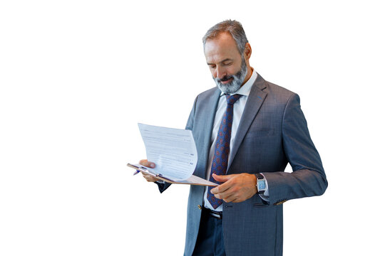 Mature businessman reviewing documents on clipboard, transparent background