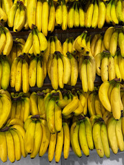 Fresh Yellow Bananas on Market Shelves © Agung