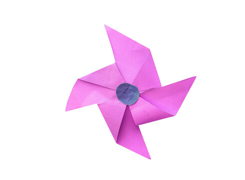Pink paper pinwheel toy for decoration and creative craft designs.