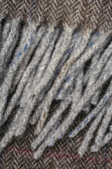 Close-up of gray fuzzy textile fabric © Anastasiia