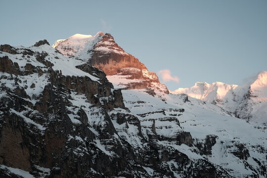 Warm light on snowy mountain in Grindelwald