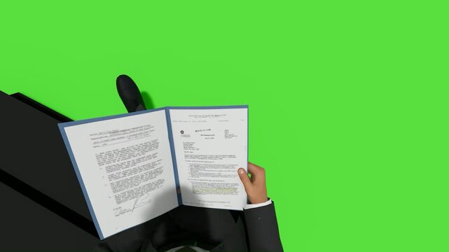 Businessman Reading Document on Green Screen Background