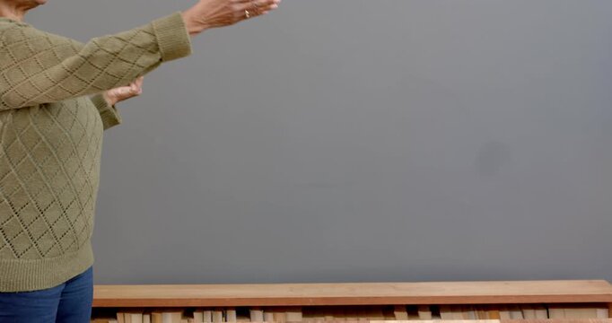 Close up of people talking to the camera, holding invisible object, person gesturing with hands in f