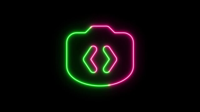 Glowing neon camera icon with coding brackets symbol in pink and green light on a dark black background