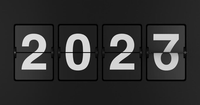 4k Resolution Video: New Year Countdown Concept. Black Mechanical Flip Clock Shows Date Flipping From 2026 To 2027 On Dark Background