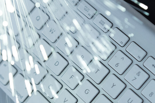 Fiber Optic Light Trails Over Computer Keyboard
