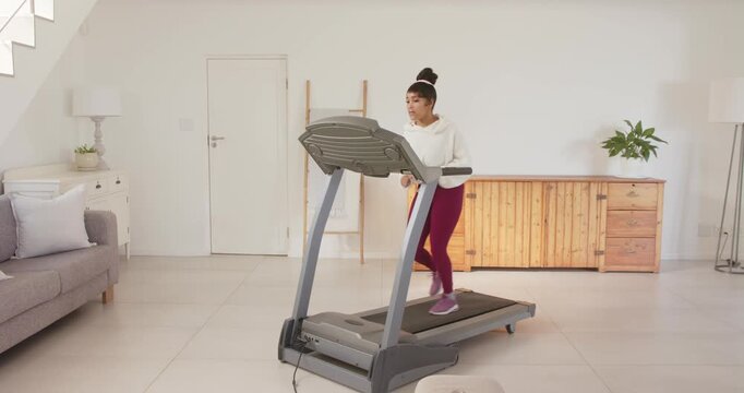 Lifestyle videos indoor of people doing activities at home, exercising on treadmill, woman in home g