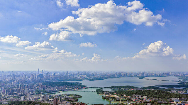 Aerial View of Wuhan City Skyline and East Lake with Blue Sky and Clouds