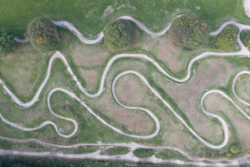 Obraz premium Top-down Aerial Image Over Mountain Bike Flow Trails and Berms at Middleton Park, Leeds. 