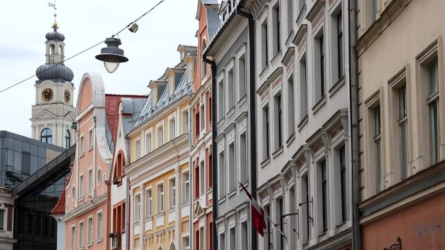 View from Tirgonu street with Riga Town Hall tower in Old Town of Riga, Latvia