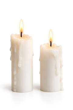 Two Burning White Candles Symbolizing Marriage, Love and a Life Together