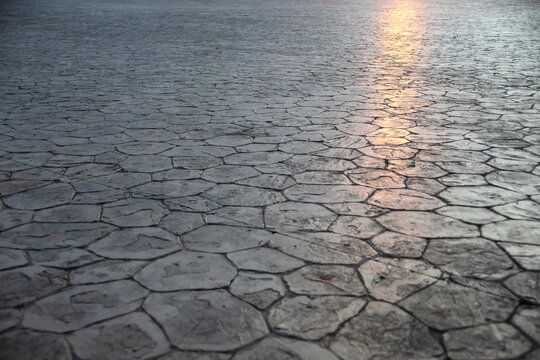 Water surface with ripples and sunlight reflections