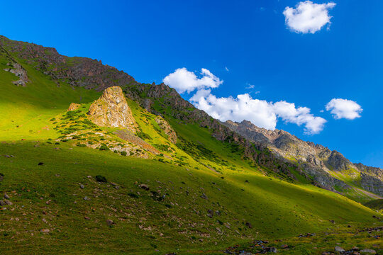 Vast Mountain Landscape Under Bright Blue Sky