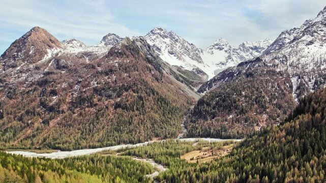 Flying above Valmalenco in the autumn season, Lombardy landscape, Italy