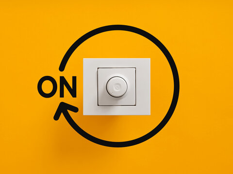 Light dimmer switch turning on concept with arrow