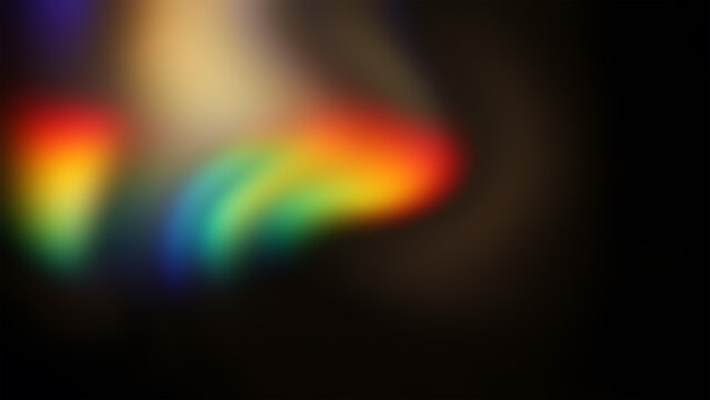 Abstract rainbow light leak, soft blurred prism colors on black background