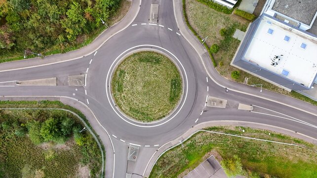 Aerial View of a Modern Roundabout and Urban Road Intersection