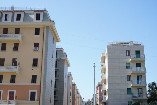 Modern Residential Apartment Buildings Under Clear Blue Summer Sky