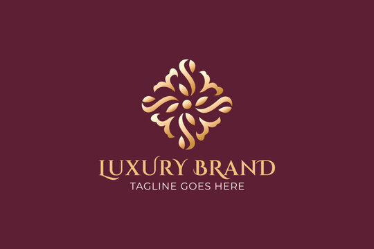 Luxury Gold Ornamental Floral Crest Logo Icon for Premium Hotel Branding   