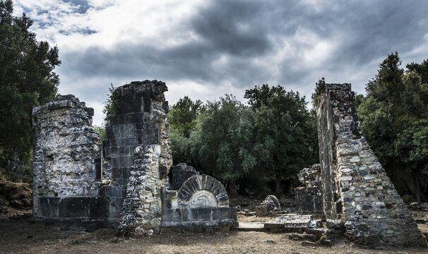 Ruins of the church of Santa Maria di Riscamone against a dramatic sky, Valle di-Rostino, Haute-Corse, Corsica, France