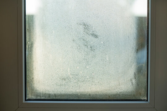 Condensation on a Fogged Window Caused by High Indoor Humidity and Poor Heating
