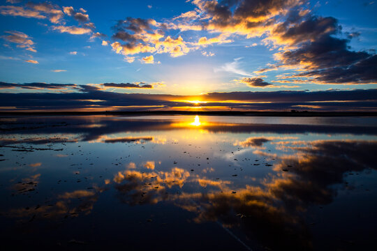 Sunset reflections on Lake Tyrrell, a salt lake in Victoria, Australia.