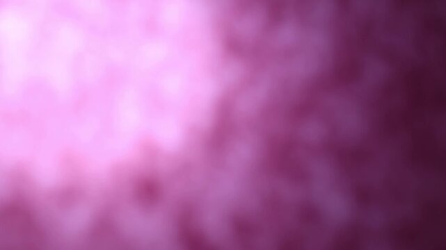Una toma de cerca de un fondo abstracto de color violeta, morado y rosado con un degradado ligero desenfocado en movimiento