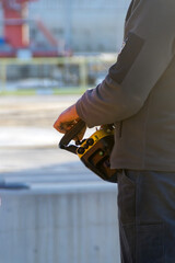 close-up of portable industrial radio remote control used for safely operating heavy machinery in hazardous environments © Olga