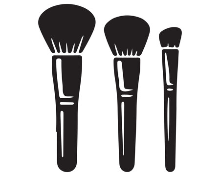 Set of three makeup brushes for foundation powder and eye shadow application