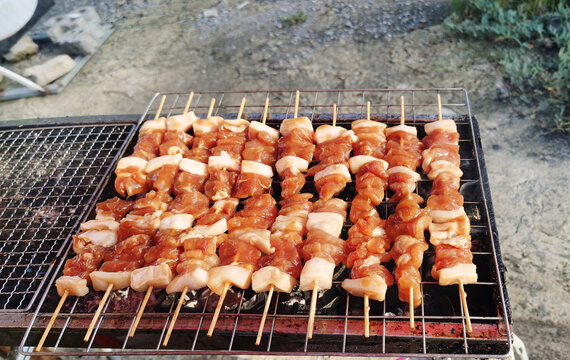 Thai style grilled pork barbecue or Moo Ping before cooked.