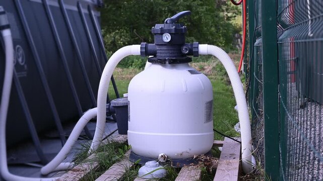 sand filter with a pump for pool water cleaning and circulation