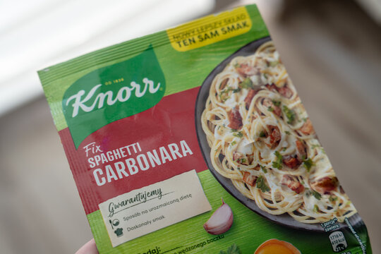 Warsaw, Poland - Sep 20, 2026: Knorr Fix Spaghetti Carbonara sachet showing the product photo with pasta, egg yolk and garlic printed on the front of the pack