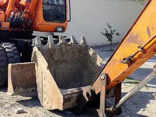 Heavy excavator working on a construction site © Rana